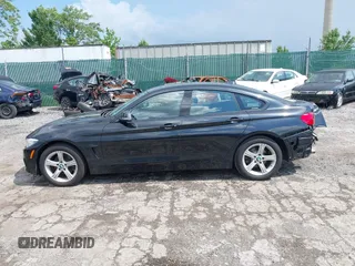 2015 BMW 4 Series 428i xDrive with VIN WBA4C9C52FD331620, listed as a IAAI auction lot 42556526 with 115,674 mi miles and . Bid and sale history available at DreamBid. Image 15.