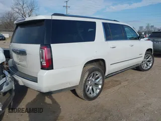 2020 GMC Yukon XL Denali with VIN 1GKS1HKJ6LR282854, listed as a IAAI auction lot 41717072 with 56,715 mi miles and . Bid and sale history available at DreamBid. Image 4.