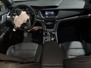2025 Cadillac XT5 AWD Premium Luxury z VIN 1GYKNDRS0SZ119763, wystawiony jako Copart lot #57577715 z przebiegiem 10 682 mil mil oraz Tytuł czysty. Historia ofert i sprzedaży dostępna na DreamBid. Obrazek 8.