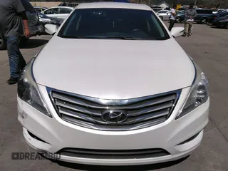 2014 Hyundai Azera with VIN KMHFG4JG8EA346609, listed as a IAAI auction lot 42010249 with 105,646 mi miles and . Bid and sale history available at DreamBid. Image 13.