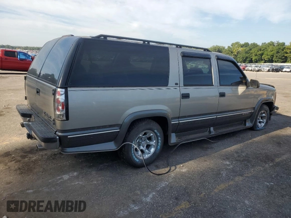 1999 Chevrolet Suburban with VIN 1GNEC16R9XJ490863, listed as a Copart auction lot 65938594 with 176,391 mi miles and Salvage Title. Bid and sale history available at carsss.com. Image 3.