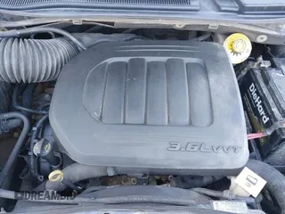 2019 Dodge Grand Caravan SXT with VIN 2C4RDGCG9KR637121, listed as a IAAI auction lot 41636355 with 177,073 mi miles and . Bid and sale history available at DreamBid. Image 10.