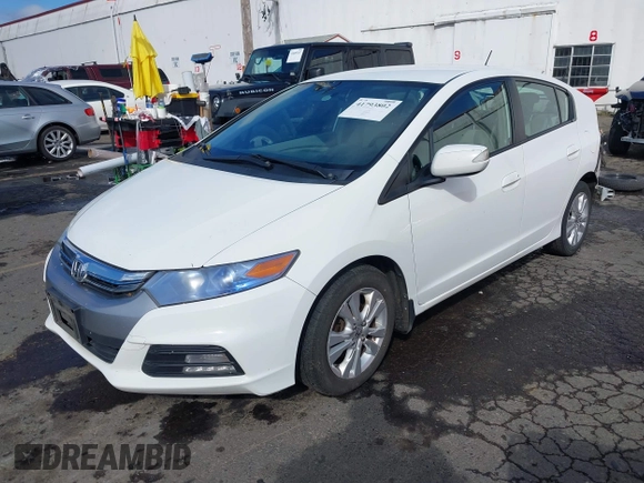 2012 Honda Insight EX z VIN JHMZE2H76CS005510, wystawiony jako IAAI lot #41793802 z przebiegiem 142 178 mil mil oraz . Historia ofert i sprzedaży dostępna na DreamBid. Obrazek 19.