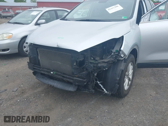 2020 Kia Sorento LX z VIN 5XYPG4A33LG680825, wystawiony jako IAAI lot #42357206 z przebiegiem 88 359 mil mil oraz . Historia ofert i sprzedaży dostępna na DreamBid. Obrazek 6.