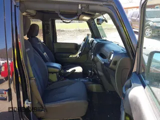 2017 Jeep Wrangler Unlimited Sahara with VIN 1C4BJWEG4HL605843, listed as a IAAI auction lot 41883085 with 93,752 mi miles. Bid and sale history available at carsss.com. Image 5.