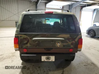 1998 Jeep Cherokee Sport with VIN 1J4FJ68S7WL269467, listed as a Copart auction lot 58664135 with 187,741 mi miles and Clean title. Bid and sale history available at DreamBid. Image 6.