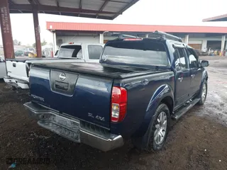 2011 Nissan Frontier PRO-4X with VIN 1N6AD0EV7BC426151, listed as a IAAI auction lot 41751873 with 152,464 mi miles. Bid and sale history available at carsss.com. Image 4.