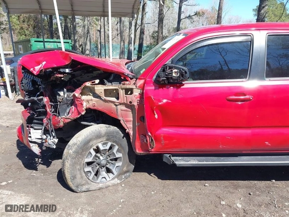 2019 Toyota Tacoma 4WD SR with VIN 3TMCZ5ANXKM279726, listed as a IAAI auction lot 41811749 with 56,017 mi miles. Bid and sale history available at carsss.com. Image 16.