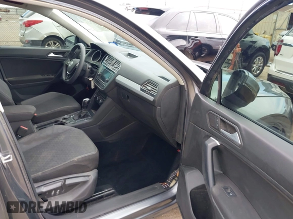 2021 Volkswagen Tiguan S with VIN 3VV0B7AX0MM017433, listed as a IAAI auction lot 42017125 with 54,624 mi miles and . Bid and sale history available at DreamBid. Image 5.