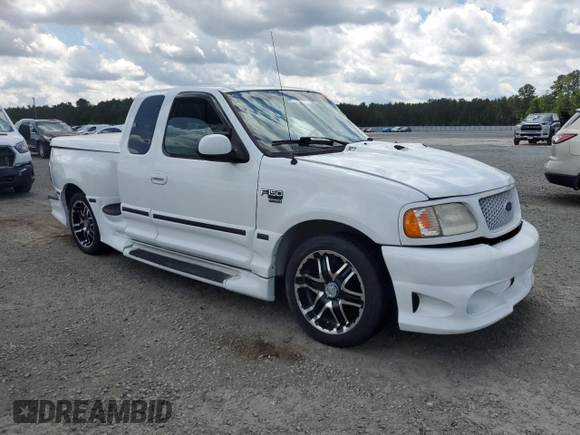 2003 Ford F-150 XL with VIN 2FTRX07L53CA21913, listed as a Copart auction lot 55483045 with 172,637 mi miles and Salvage title. Bid and sale history available at DreamBid. Image 4.