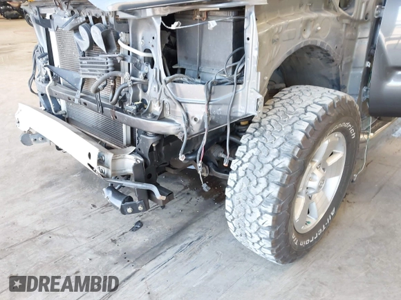 2013 Toyota Tacoma with VIN 3TMLU4EN7DM121253, listed as a IAAI auction lot 42498187 with 145,604 mi miles and . Bid and sale history available at DreamBid. Image 6.