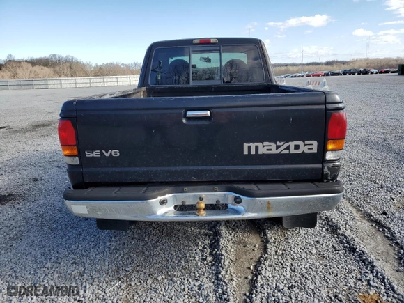 1999 Mazda B-Series 4WD Truck SE with VIN 4F4ZR17V9XTM08565, listed as a Copart auction lot 49249005 with 180,943 mi miles and Salvage Title. Bid and sale history available at carsss.com. Image 6.
