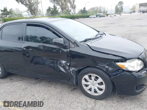 2010 Toyota Corolla with VIN 1NXBU4EE1AZ285449, listed as a IAAI auction lot 42040668 with 121,404 mi miles and . Bid and sale history available at carsss.com. Image 6.