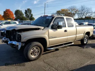 2005 GMC Sierra 2500HD SLT with VIN 1GTHK29235E120804, listed as a Copart auction lot 77440914 with 216,700 mi miles and Salvage title. Bid and sale history available at DreamBid. Image 1.