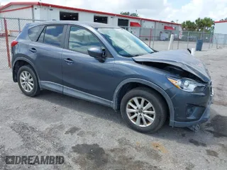 2013 Mazda CX-5 Touring with VIN JM3KE2CE8D0123488, listed as a IAAI auction lot 41952747 with 201,426 mi miles. Bid and sale history available at carsss.com. Image 1.
