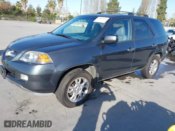 2006 Acura MDX Touring with VIN 2HNYD18726H533142, listed as a IAAI auction lot 42007839 with 216,910 mi miles. Bid and sale history available at carsss.com. Image 2.