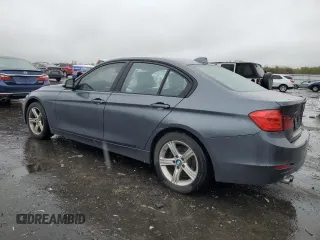 2013 BMW 3 Series 328i xDrive with VIN WBA3B3C51DF537086, listed as a Copart auction lot 53000695 with 231,937 mi miles and Clean Title. Bid and sale history available at carsss.com. Image 2.