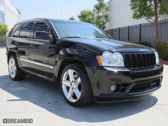 2007 Jeep Grand Cherokee SRT-8 with VIN 1J8HR78347C515195, listed as a Copart auction lot 77478044 with 126,330 mi miles and Salvage Title. Bid and sale history available at carsss.com. Image 1.