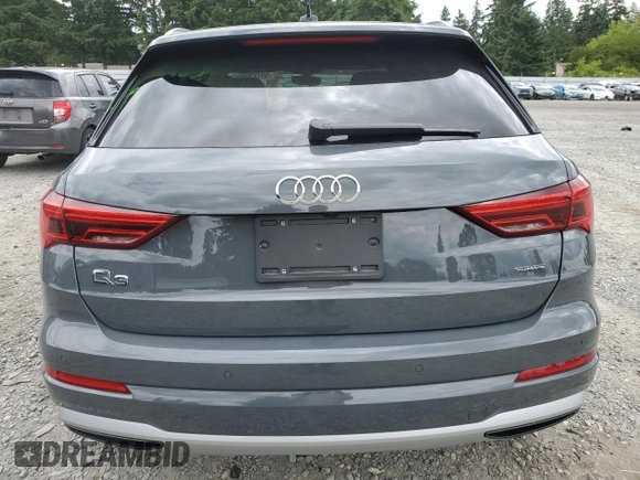 2020 Audi Q3 Premium with VIN WA1AECF31L1002342, listed as a Copart auction lot 60729665 with 29,154 mi miles and Salvage title. Bid and sale history available at DreamBid. Image 6.