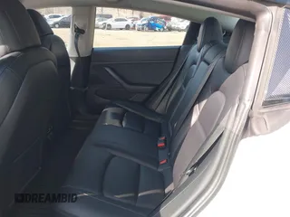 2021 Tesla Model 3 Long Range with VIN 5YJ3E1EB2MF858267, listed as a IAAI auction lot 41782360 with 79,671 mi miles and . Bid and sale history available at DreamBid. Image 8.