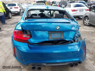 2017 BMW M2 with VIN WBS1H9C53HV887089, listed as a IAAI auction lot 41731841 with 57,509 mi miles. Bid and sale history available at carsss.com. Image 16.