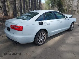 2014 Audi A6 Premium Plus with VIN WAUGFAFC0EN015674, listed as a IAAI auction lot 41879910 with 142,398 mi miles and . Bid and sale history available at DreamBid. Image 4.