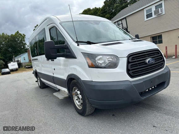 2015 Ford Transit Wagon XL with VIN 1FDZX2CM5FKA43044, listed as a Copart auction lot 73170894 with 215,199 mi miles and Clean Title. Bid and sale history available at carsss.com. Image 4.