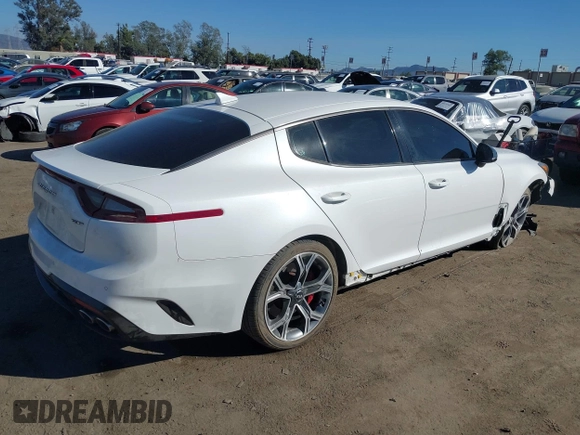 2020 Kia Stinger GT with VIN KNAE35LC7L6085529, listed as a IAAI auction lot 40671705 with 62,970 mi miles. Bid and sale history available at carsss.com. Image 4.