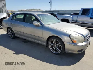 2006 Infiniti Q45 z VIN JNKBF01A46M800170, wystawiony jako Copart lot #57114275 z przebiegiem 197 502 mil mil oraz Tytuł czysty. Historia ofert i sprzedaży dostępna na DreamBid. Obrazek 4.