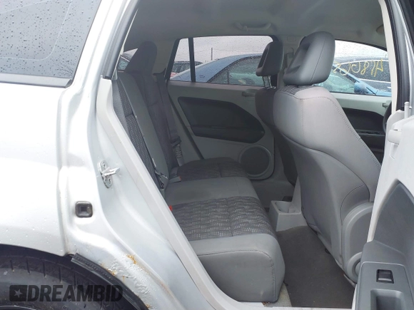 2007 Dodge Caliber SXT with VIN 1B3HB48BX7D379555, listed as a IAAI auction lot 41806050 with 99,662 mi miles and . Bid and sale history available at DreamBid. Image 8.