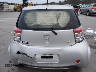 2012 Scion iQ with VIN JTNJJXB03CJ018641, listed as a Copart auction lot 82653104 with 118,617 mi miles and Salvage Title. Bid and sale history available at carsss.com. Image 6.