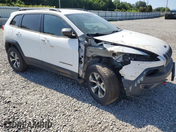 2015 Jeep Cherokee Trailhawk with VIN 1C4PJMBB1FW771865, listed as a Copart auction lot 61905315 with 99,554 mi miles and Clean title. Bid and sale history available at DreamBid. Image 4.