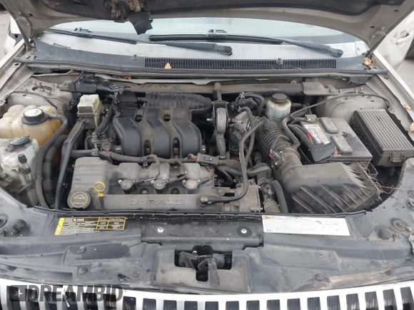 2005 Mercury Montego Luxury z VIN 1MEFM40185G611793, wystawiony jako IAAI lot #41125667 z przebiegiem Nie podano mil oraz . Historia ofert i sprzedaży dostępna na DreamBid. Obrazek 10.