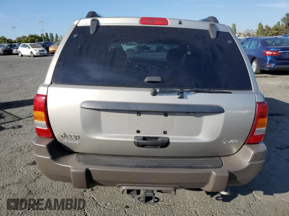 2003 Jeep Grand Cherokee with VIN 1J8GW48N43C593488, listed as a Copart auction lot 60466805 with 70,882 mi miles and Salvage title. Bid and sale history available at DreamBid. Image 6.