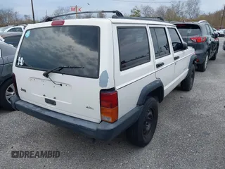 1998 Jeep Cherokee Sport with VIN 1J4FT68S5WL199283, listed as a IAAI auction lot 38377285 with 208,074 mi miles. Bid and sale history available at carsss.com. Image 4.