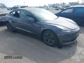 2023 Tesla Model 3 z VIN 5YJ3E1EA0PF577869, wystawiony jako IAAI lot #41468956 z przebiegiem 38 760 mil mil oraz . Historia ofert i sprzedaży dostępna na DreamBid. Obrazek 1.