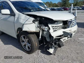 2009 Nissan Rogue SL with VIN JN8AS58T39W058077, listed as a IAAI auction lot 41311692 with 131,765 mi miles and . Bid and sale history available at DreamBid. Image 6.