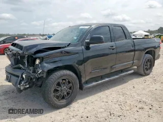 2014 Toyota Tundra SR z VIN 5TFRM5F12EX071952, wystawiony jako Copart lot #57252215 z przebiegiem 143 706 mil mil oraz Szkoda całkowita • Salvage title. Historia ofert i sprzedaży dostępna na DreamBid. Obrazek 1.