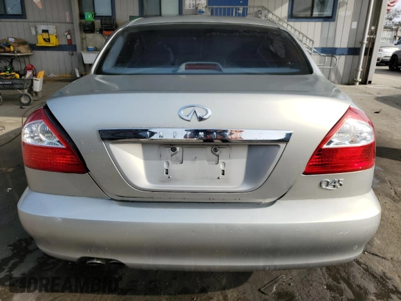 2003 Infiniti Q45 z VIN JNKBF01A03M101890, wystawiony jako Copart lot #86930994 z przebiegiem 158 134 mil mil oraz Szkody całkowita. Historia ofert i sprzedaży dostępna na DreamBid. Obrazek 6.