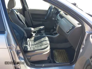 2011 Ford Focus SES with VIN 1FAHP3GN4BW136106, listed as a IAAI auction lot 41738992 with 163,167 mi miles. Bid and sale history available at carsss.com. Image 5.