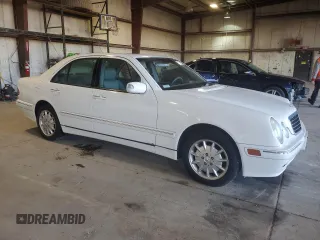 2000 Mercedes-Benz E-Class AWD with VIN WDBJF82J1YX029676, listed as a Copart auction lot 79412174 with 96,324 mi miles and Clean Title. Bid and sale history available at carsss.com. Image 4.