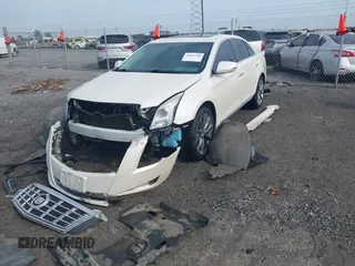 2013 Cadillac XTS with VIN 2G61N5S39D9145885, listed as a IAAI auction lot 42044388 with 181,645 mi miles and . Bid and sale history available at DreamBid. Image 19.