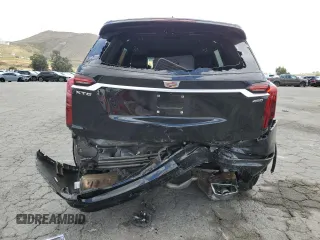 2023 Cadillac XT6 FWD Premium Luxury with VIN 1GYKPCRS5PZ220616, listed as a Copart auction lot 56913725 with 25,860 mi miles and Salvage title. Bid and sale history available at DreamBid. Image 6.