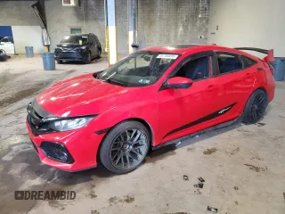 2019 Honda Civic Si z VIN 2HGFC1E5XKH701320, wystawiony jako Copart lot #54186895 z przebiegiem Nie podano mil oraz Szkody całkowita. Historia ofert i sprzedaży dostępna na DreamBid. Obrazek 1.