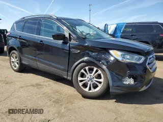 2017 Ford Escape SE z VIN 1FMCU0GD5HUD52467, wystawiony jako Copart lot #70616944 z przebiegiem 115 876 mil mil oraz Szkoda całkowita • Salvage title. Historia ofert i sprzedaży dostępna na DreamBid. Obrazek 4.