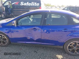 2013 Ford Focus SE z VIN 1FADP3F28DL178210, wystawiony jako IAAI lot #42199073 z przebiegiem 110 542 mil mil oraz . Historia ofert i sprzedaży dostępna na DreamBid. Obrazek 6.