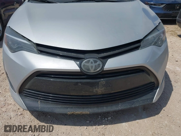 2018 Toyota Corolla L with VIN 2T1BURHE1JC986244, listed as a IAAI auction lot 41942626 with Not provided miles and . Bid and sale history available at DreamBid. Image 6.