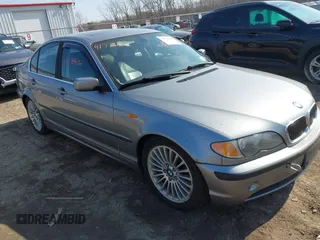2003 BMW 3 Series 330xi with VIN WBAEW534X3PN31070, listed as a IAAI auction lot 41776406 with 176,383 mi miles. Bid and sale history available at carsss.com. Image 1.