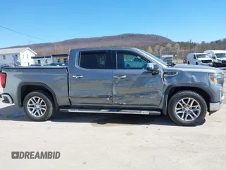 2021 GMC Sierra 1500 SLT z VIN 3GTU9DED7MG224460, wystawiony jako IAAI lot #41848912 z przebiegiem 65 319 mil mil oraz . Historia ofert i sprzedaży dostępna na DreamBid. Obrazek 6.