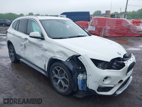 2018 BMW X1 xDrive28i with VIN WBXHT3C38J5L31322, listed as a IAAI auction lot 42260190 with 70,266 mi miles and . Bid and sale history available at DreamBid. Image 18.